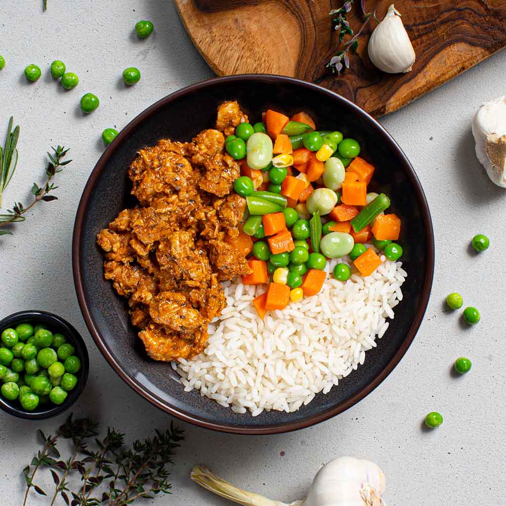 Kip Classic met gemengde groenten en rijst voor tijdens het bulken om spiermassa aan te komen