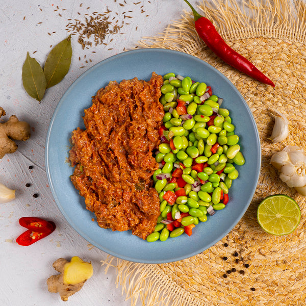 Beef Rendang van SportMeals, 350 gram, opgeschept op een bord