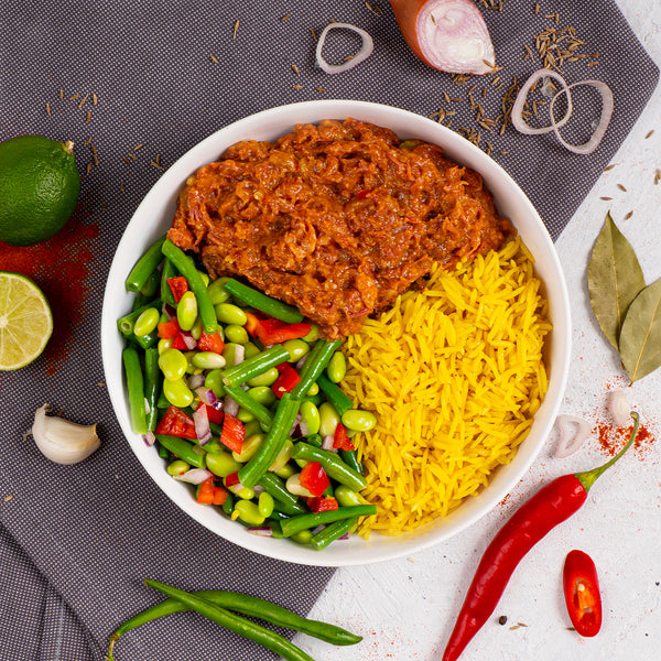 Beef Rendang van SportMeals, 425 gram, opgeschept op een bord