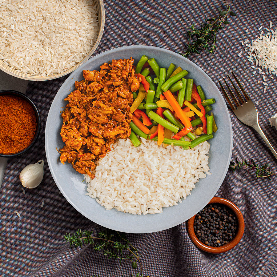 SportMeals Chicken Piri Piri with rice and stir-fry vegetables, served on a plate