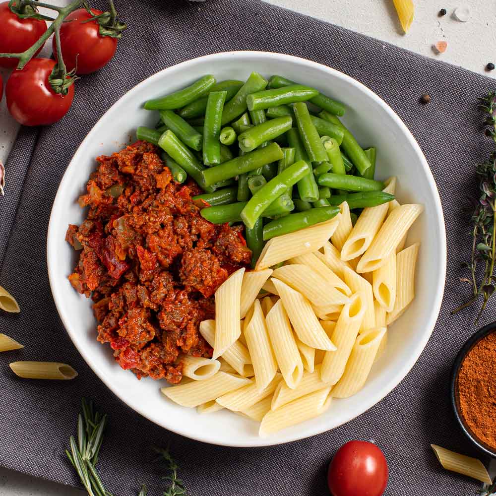 Lekker en verantwoord afvallen doe je met de eiwitrijke pasta beef bolognese van PRAZ